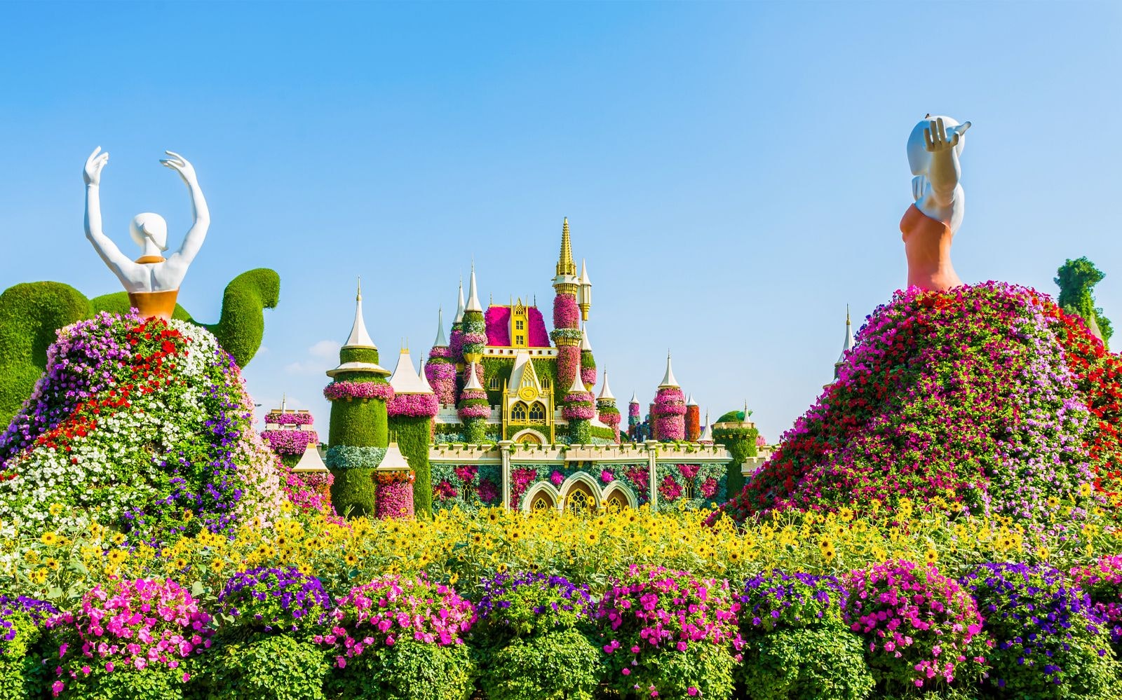 Colorful floral sculptures and castle.